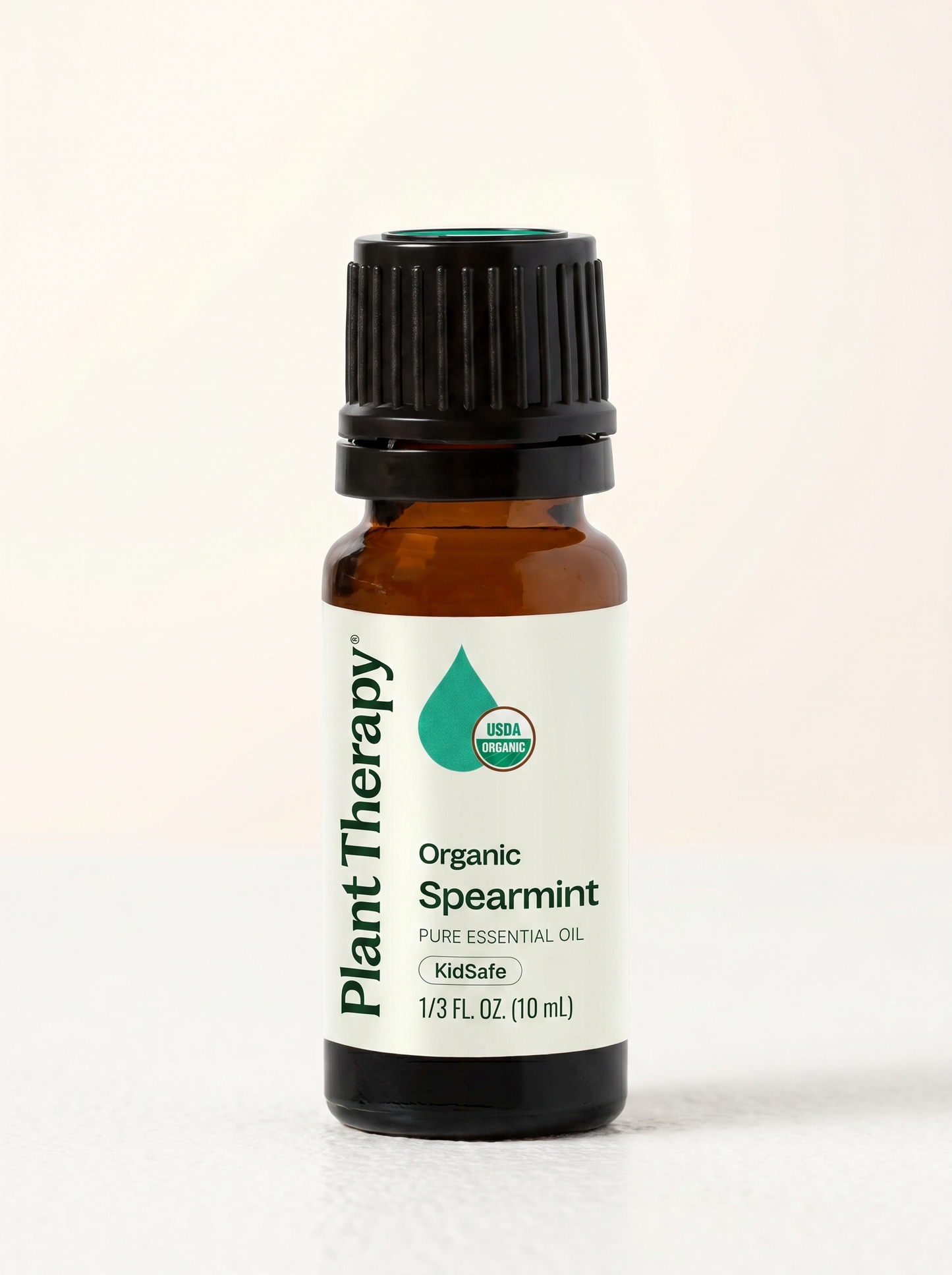 Bottle of organic spearmint essential oil
